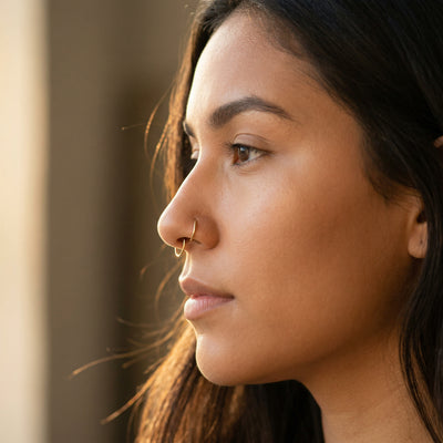 Septum Piercing: Complete Guide to Pain, Healing & Gold Rings