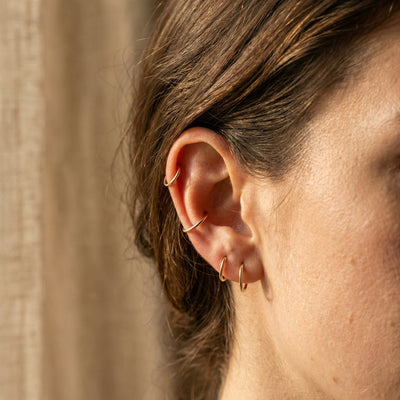 Lobe Piercing: Complete Guide to Stacking, Sizing & Gold Hoops
