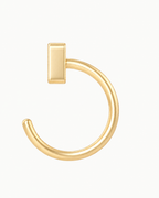A made-to-order&nbsp;14K gold Number Huggie Hoop&nbsp;for the number you actually want to keep close. Choose any whole number from&nbsp;1–99&nbsp;— a birthday or anniversary date, lucky number, milestone, jersey number, or a number with a meaning that is personal to you. Single- and double-digit numbers are both available. Then choose yellow, white or rose gold,&nbsp;18G or 20G, and a&nbsp;6–12mm inner diameter&nbsp;for the fit you prefer. The open hoop design is easy to guide through a suitable, fully heal