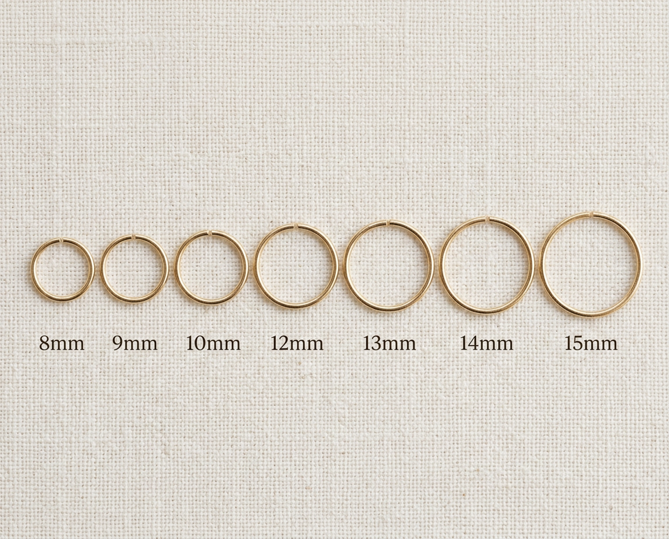 14K gold huggie hoop earring size comparison showing 8mm 9mm 10mm 11mm 12mm