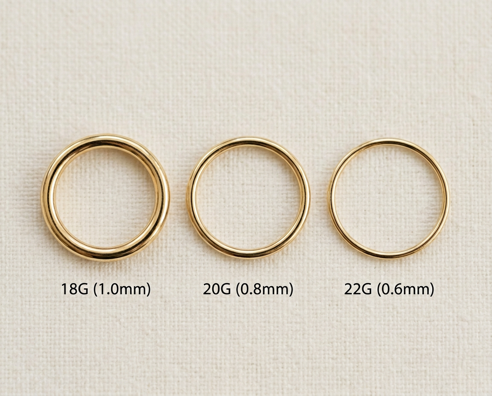 14K gold nose ring gauge comparison showing 18G, 20G, and 22G wire thickness side by side