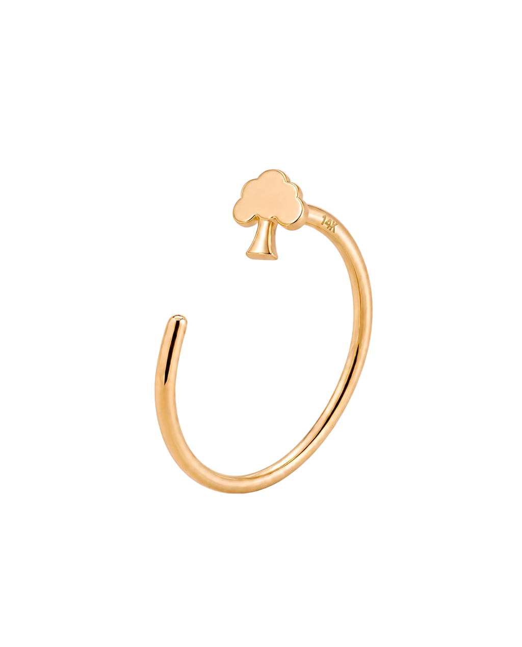 A gold open-ended ring featuring a small tree-shaped gold nose ring  at the top, displayed on a soft, light beige background.
