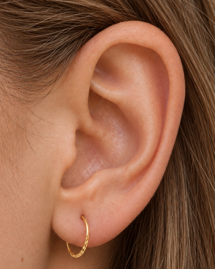 Small 14ct solid gold lobe hoop earring with unique hand-hammered texture. Choose 8–12mm, 18G or 20G, in yellow, white or rose gold. Sold individually.