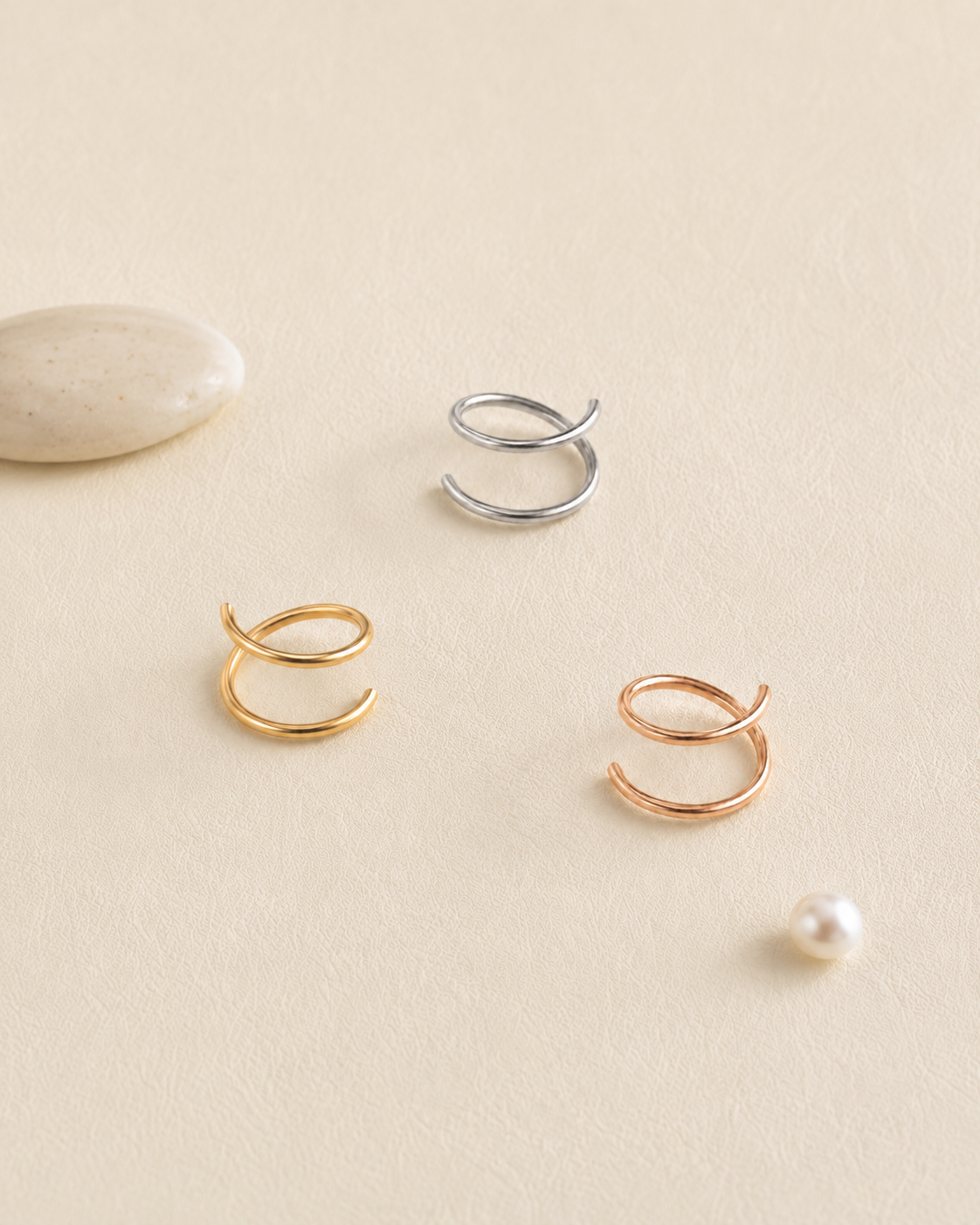 How a correctly fitted double nose ring may sit from the front and side