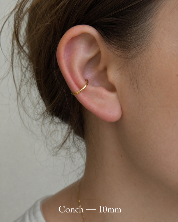 10mm 14K gold seamless conch hoop on ear