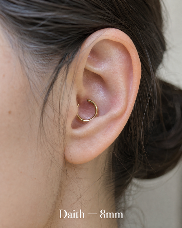 8mm 14K gold daith hoop in ear