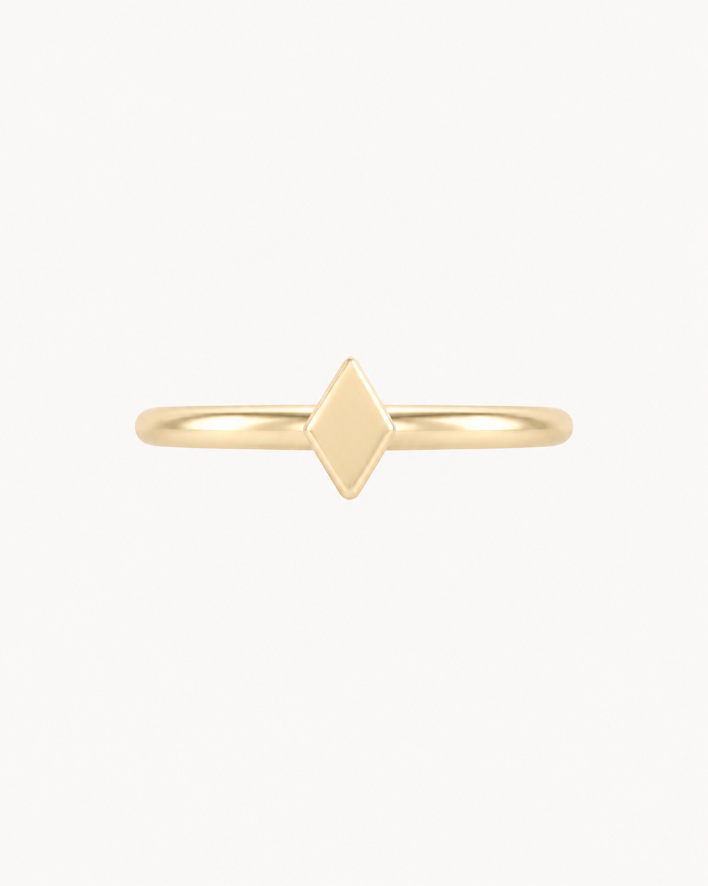 A diamond-shaped motif brings a neat angular detail without using stones or settings. Made for fully healed helix piercings, it keeps the profile compact for an upper-ear stack while leaving the motif clearly visible. Handmade to order in 14ct solid gold, it fits naturally with angular, geometric and polished styling rather than reading as a generic plain hoop.