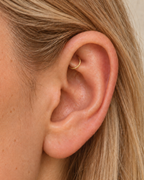 Handmade 14ct solid gold rook hoop with unique hammer marks. Choose 4–8mm, 16G, 18G or 20G, in yellow, white or rose gold for your fully healed rook piercing.