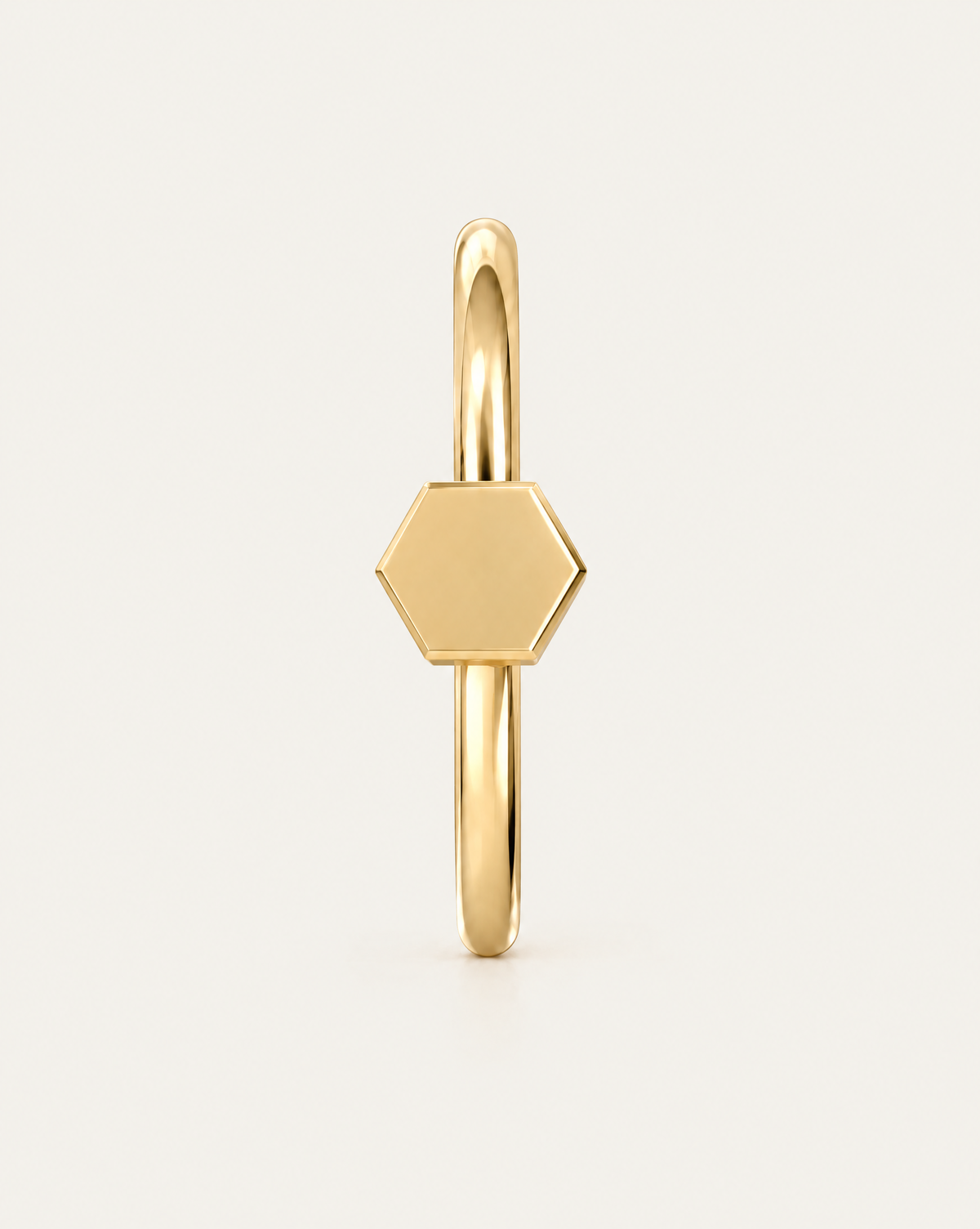 A small triangle gives the hoop a sharper geometric detail with a clean modern feel. Made for fully healed nostril piercings, the motif sits directly on a clean round hoop so the look stays neat rather than dangly. Handmade to order in 14ct solid gold, it fits naturally with clean, geometric and modern styling rather than reading as a generic plain hoop.
