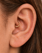 Handmade 14ct solid gold daith hoop with unique hammer marks. Choose 6–10mm, 18G or 20G, in yellow, white or rose gold for your healed inner-ear piercing.