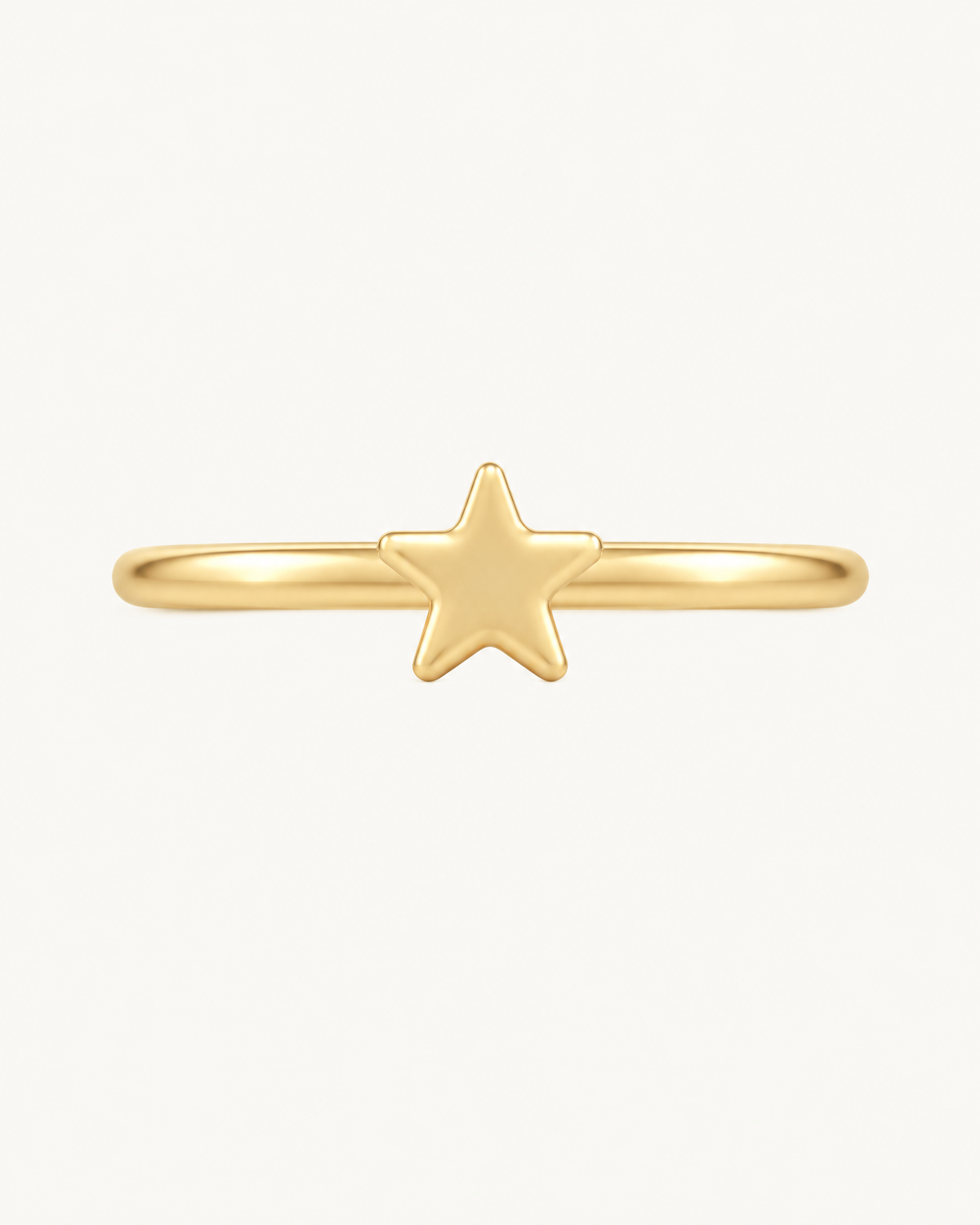 A crisp little star adds a bright celestial point to an otherwise minimal gold hoop. Made for fully healed helix piercings, it keeps the profile compact for an upper-ear stack while leaving the motif clearly visible. Handmade to order in 14ct solid gold, it fits naturally with bright, celestial and playful styling rather than reading as a generic plain hoop.