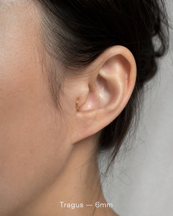 6mm 14K gold seamless tragus hoop on ear