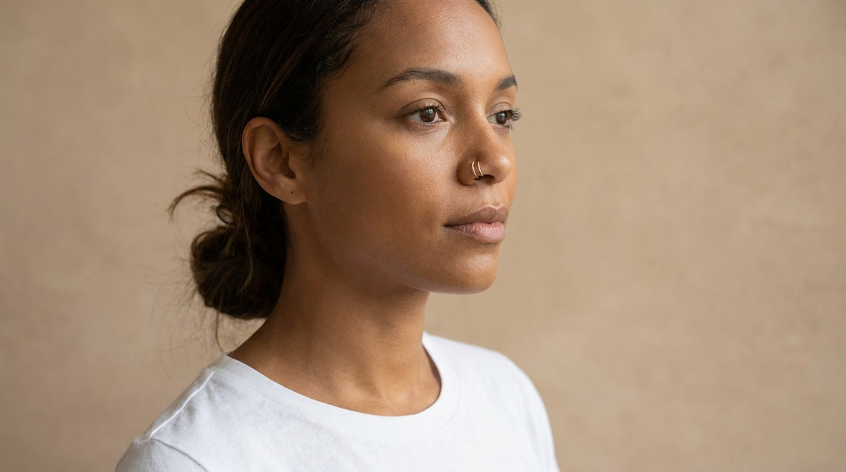 Connected double nose ring construction showing one wearable section and two visible hoops