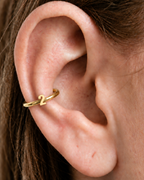 Choose one digit to give the hoop a small number-led detail with personal meaning. Made for fully healed conch piercings, it pairs the larger hoop silhouette of a conch ring with a small fixed motif for a more distinctive ear stack. Handmade to order in 14ct solid gold, it fits naturally with personalised, number-led and meaningful styling rather than reading as a generic plain hoop.
