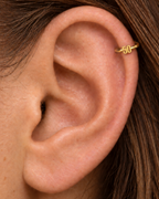 Choose a two-digit number from 10–99 for a more distinctive personalised detail. Made for fully healed helix piercings, it keeps the profile compact for an upper-ear stack while leaving the motif clearly visible. Handmade to order in 14ct solid gold, it fits naturally with personalised, number-led and meaningful styling rather than reading as a generic plain hoop.