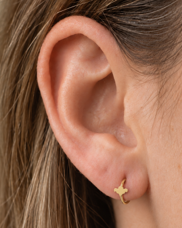 A small ghost motif adds a light spooky-season accent that still works as fine solid-gold jewellery. Made for fully healed lobe piercings and sold individually, it works easily in first, second or third-lobe stacks. Handmade to order in 14ct solid gold, it fits naturally with spooky, playful and seasonal styling rather than reading as a generic plain hoop.