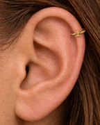 A graveyard-style cross gives the hoop a darker gothic reference that is distinct from the simpler cross design. Made for fully healed helix piercings, it keeps the profile compact for an upper-ear stack while leaving the motif clearly visible. Handmade to order in 14ct solid gold, it fits naturally with gothic, spooky and alternative styling rather than reading as a generic plain hoop.