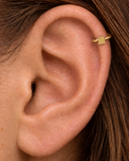 A softer cute-ghost motif keeps the Halloween reference playful rather than dark or heavy. Made for fully healed helix piercings, it keeps the profile compact for an upper-ear stack while leaving the motif clearly visible. Handmade to order in 14ct solid gold, it fits naturally with cute, playful and Halloween-led styling rather than reading as a generic plain hoop.