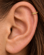 Choose one letter to turn the hoop into a small personalised piece with a clear initial-led focus. Made for fully healed helix piercings, it keeps the profile compact for an upper-ear stack while leaving the motif clearly visible. Handmade to order in 14ct solid gold, it fits naturally with personalised, meaningful and initial-led styling rather than reading as a generic plain hoop.