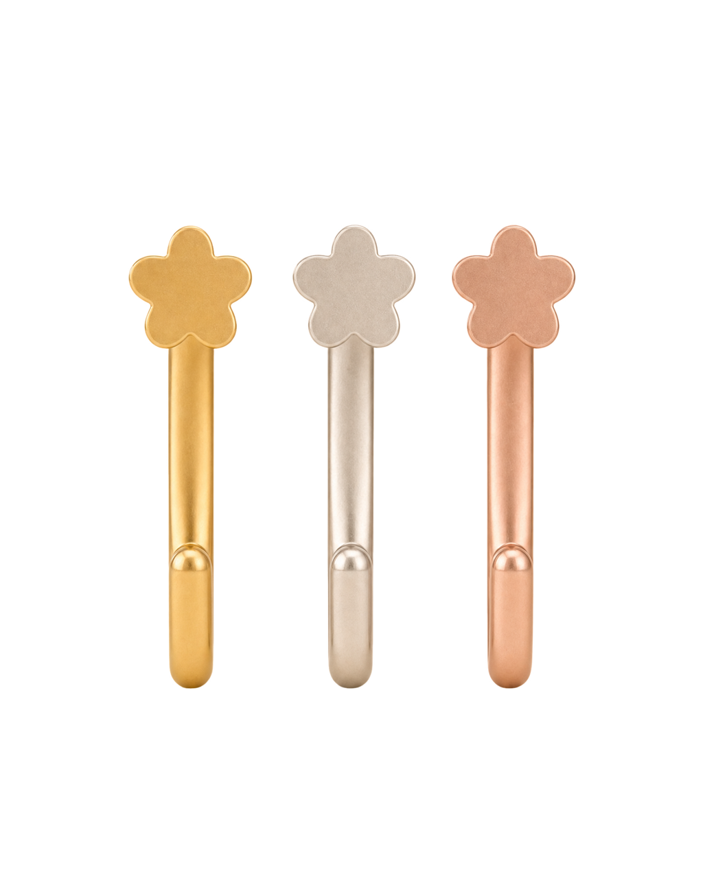 A delicate 14ct solid gold flower huggie hoop with an open design for easier fitting. No twisting or end alignment required — simply guide the smooth end through your fully healed nose or ear piercing and rotate it into position.