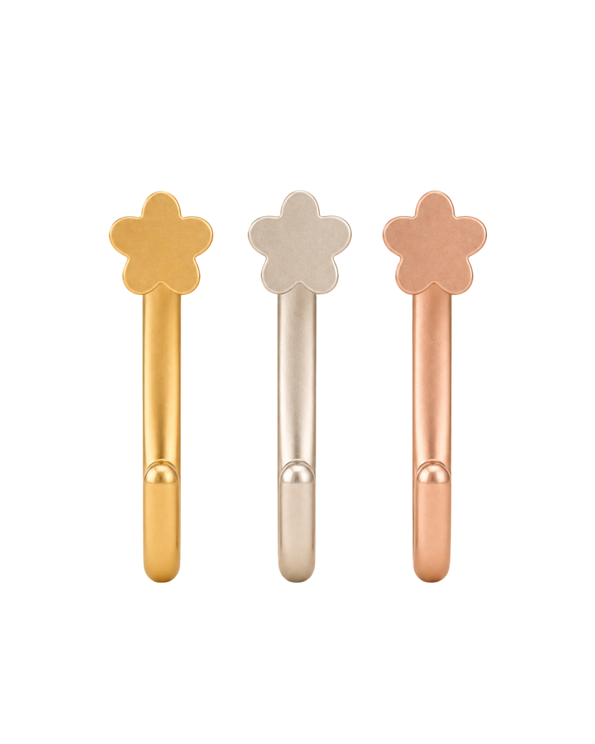 A delicate 14ct solid gold flower huggie hoop with an open design for easier fitting. No twisting or end alignment required — simply guide the smooth end through your fully healed nose or ear piercing and rotate it into position.