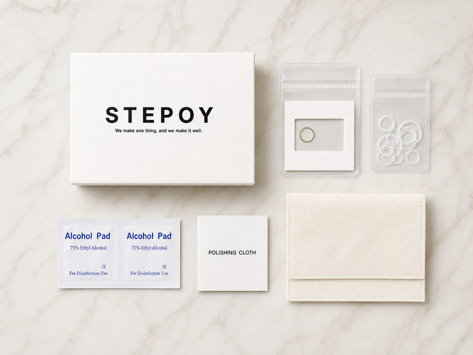STEPOY packaging and what's included with a 14ct gold hoop